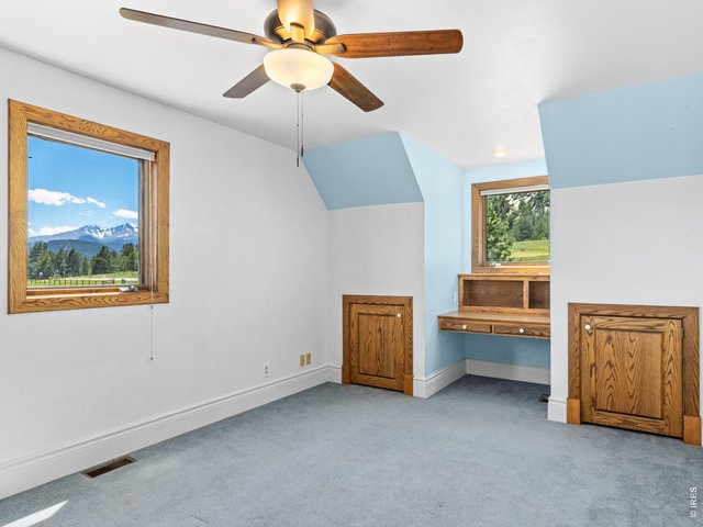 Property Photo 33 Bedroom 3 of 3, with built-ins