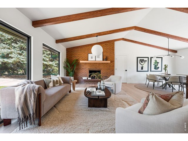 Property Photo 16 Design within Reach rice paper pendant frames fireplace