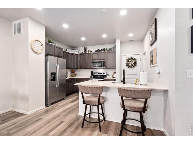 Property Photo 13 Open Kitchen with easy garage and pantry access