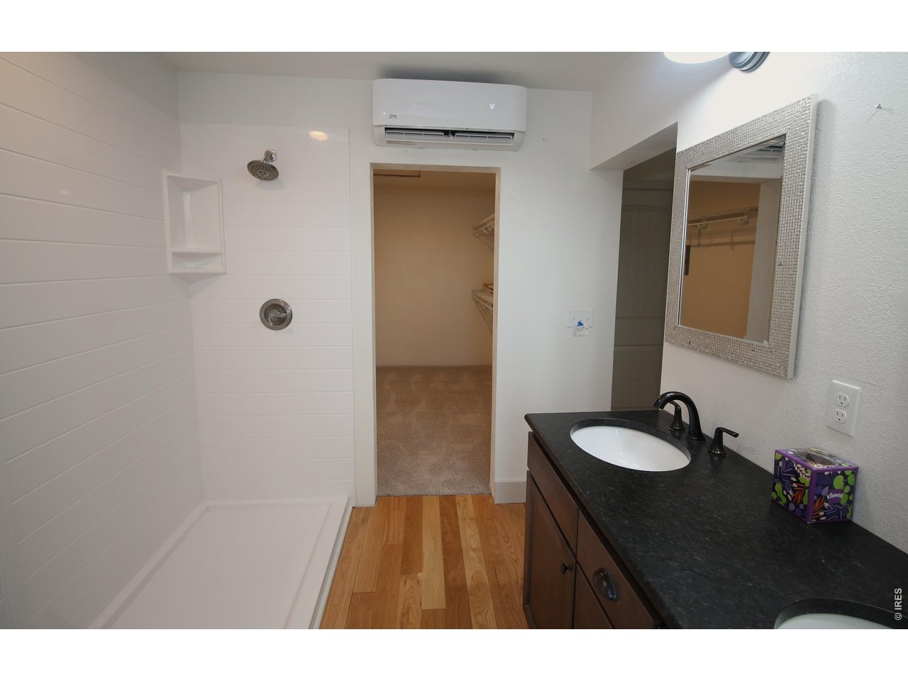 Property Photo 29 Primary Bath looking into large walk-in closet!