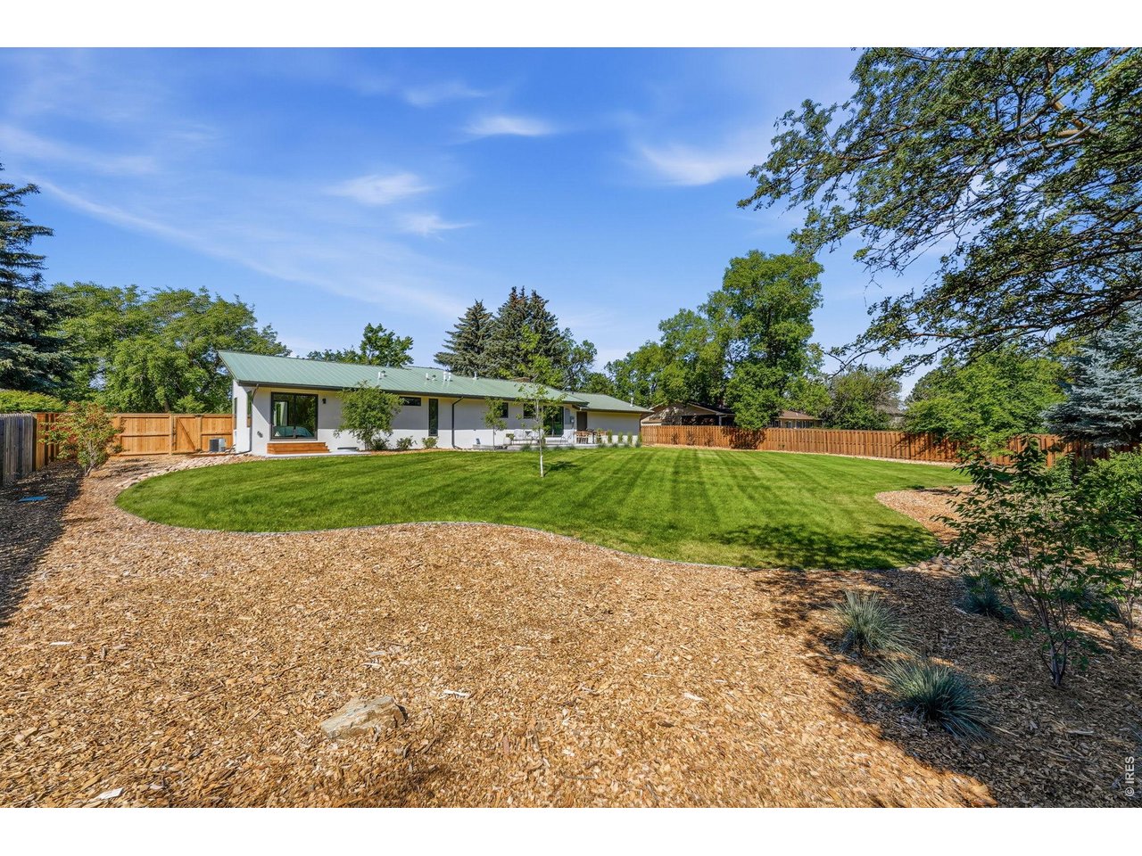 Property Photo 44 This NE corner was kept intentially open for a shed, play structure, or garden beds!
