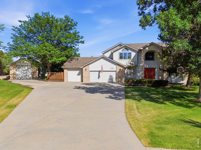 Property Photo 1 Extended Driveway and 3 Car Garage