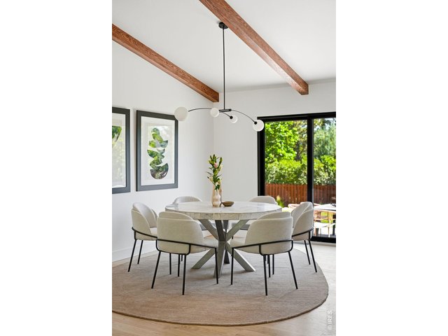 Property Photo 14 Dining space with room for a large farmhouse table or circular table & backyard through Anderson 200 slider