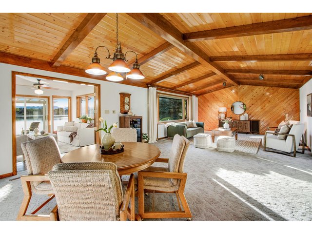 Property Photo 19 View of dining area to living room and sun room