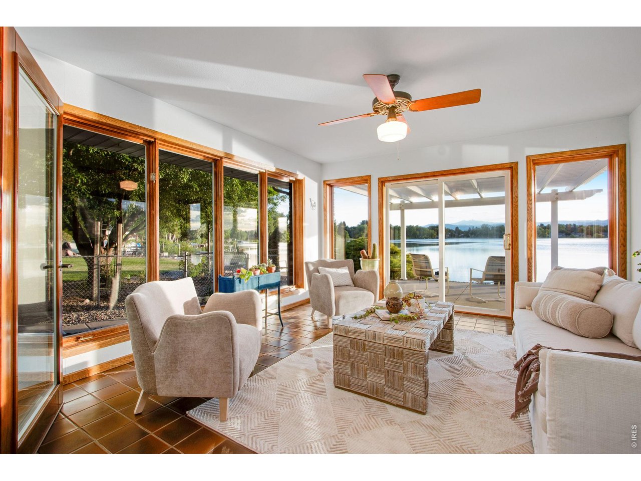 Property Photo 25 Sitting/Sun room w/ expansive nearly floort to ceiling windows