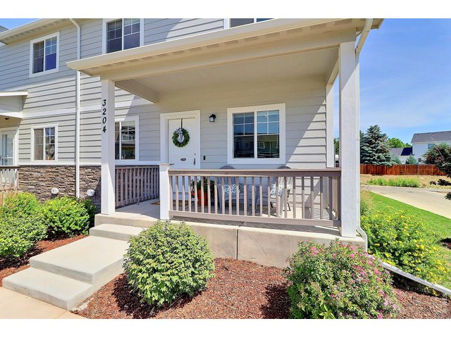Property Photo 2 Charming Covered Front Porch Entrance