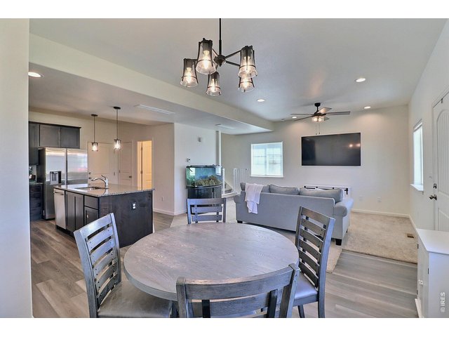 Property Photo 10 Laminate Flooring in the Dining Room and Kitchen