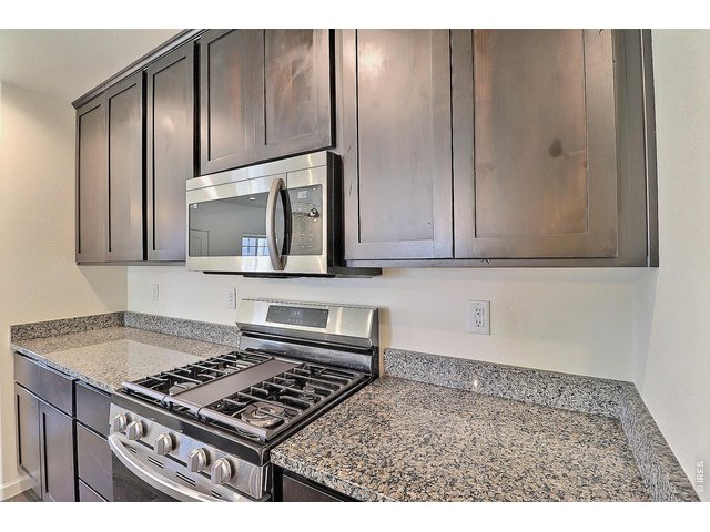 Property Photo 18 Gas Range Oven and Microwave