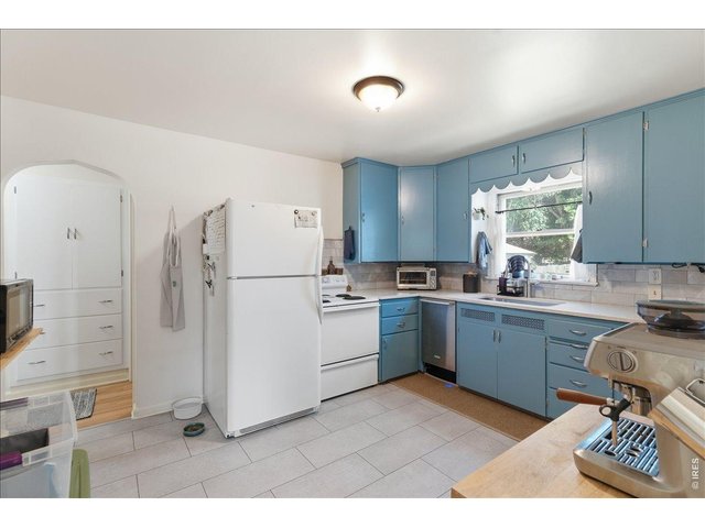 Property Photo 9 Upper unit kitchen