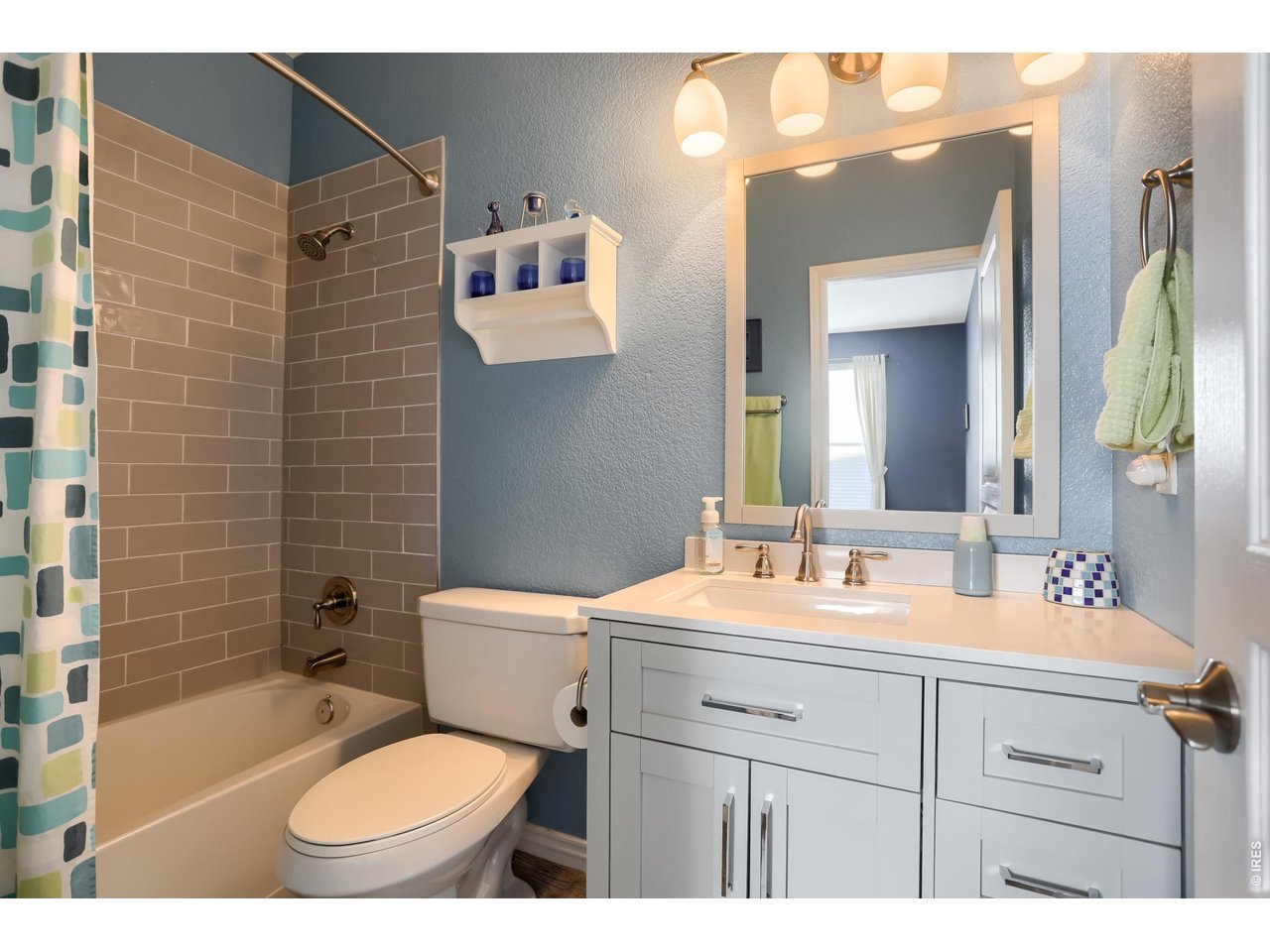 Main floor bathroom attached to bedroom