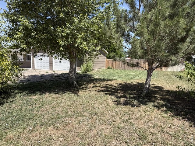 Property Photo 35 Additional parking space to the south of the garage perfect for RV storage.