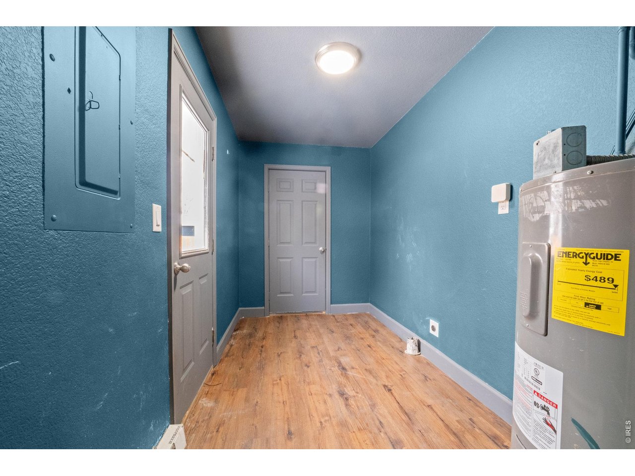 Laundry room with garage and backyard access