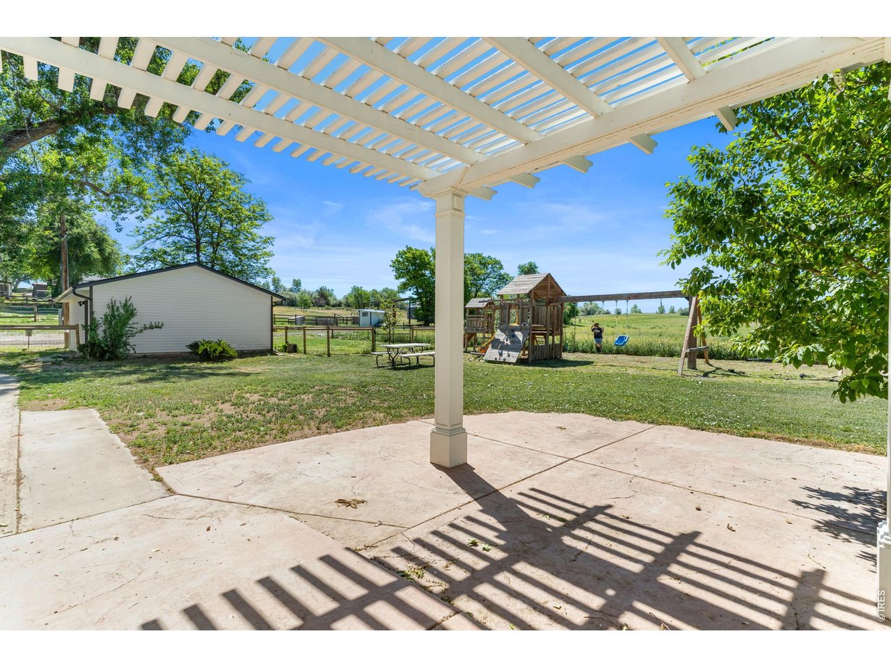 Property Photo 8 Pergola covered porch