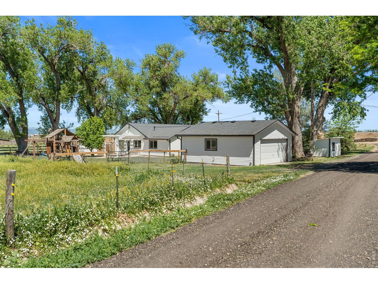 Property Photo 2 Approximately 2.3 acres with THREE outbuildings (pictured above is outbuilding #1)
