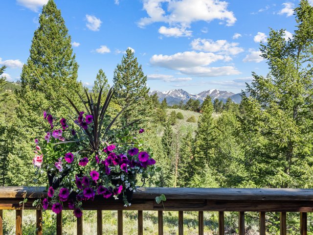 Property Photo 23 Your deck becomes a front row seat to the majestic, snow covered peaks of Rocky Mountain National Park