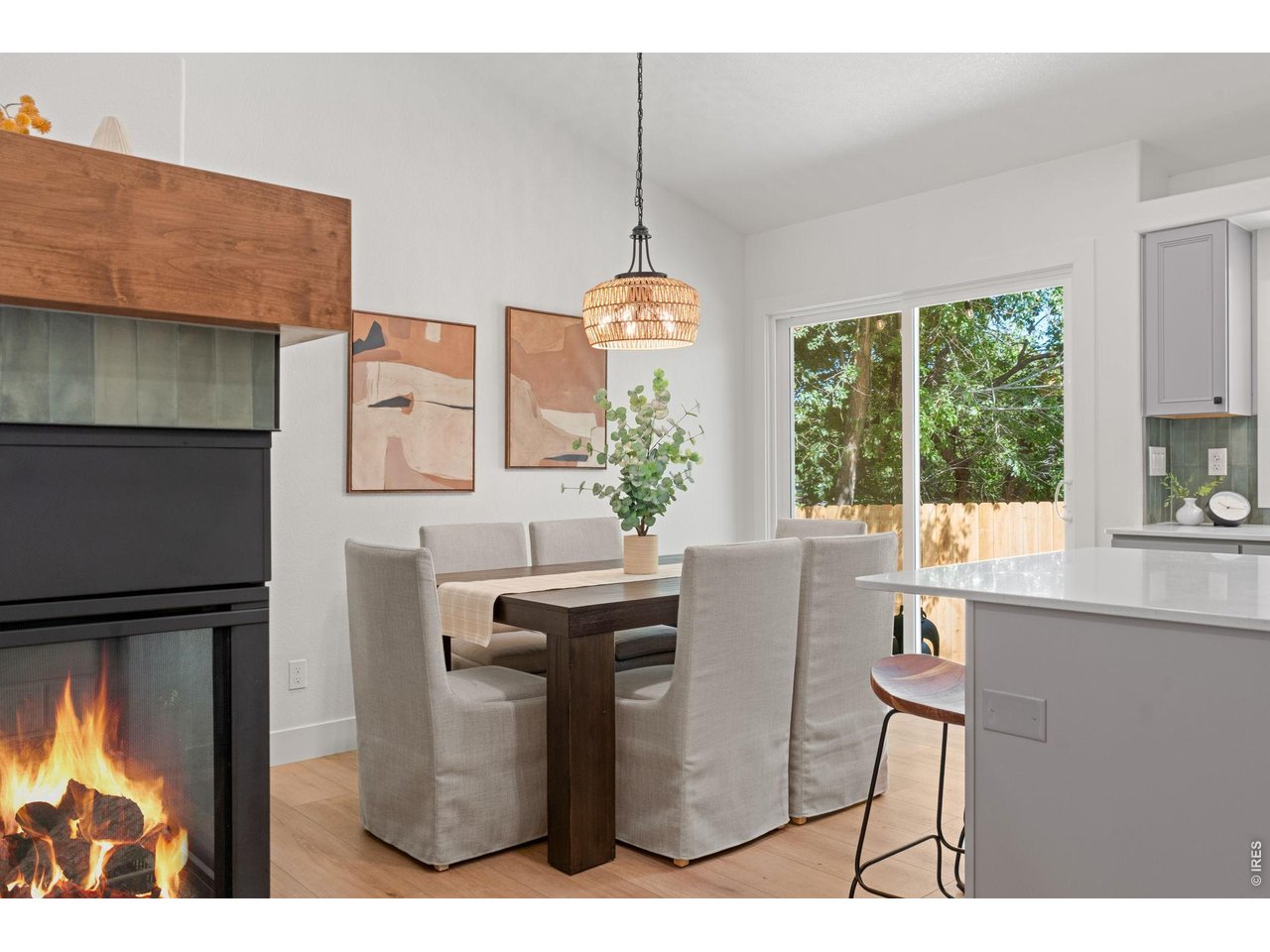 Property Photo 11 Dual-sided gas fireplace in the living and dining spaces