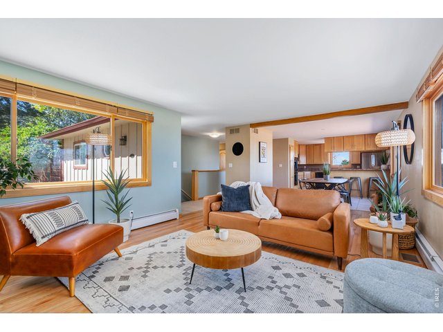 Property Photo 6 Breezy open floor plan.