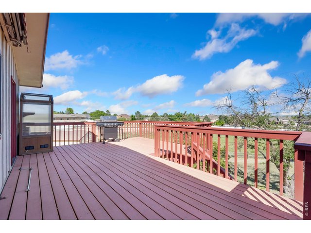 Property Photo 22 Expansive deck with wide open views.