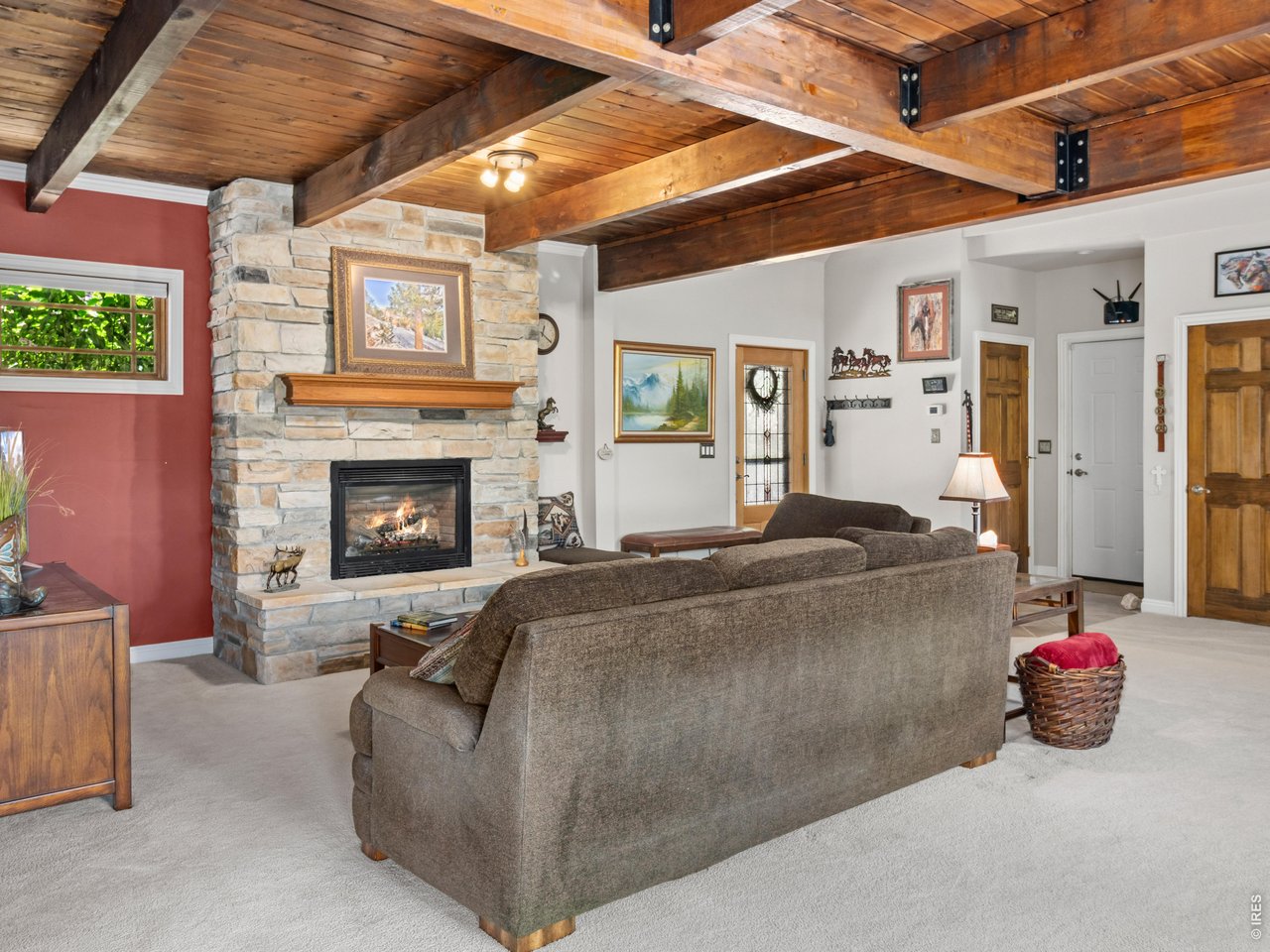 Property Photo 3 Living Room with Gas Fireplace and a Timber Ceiling