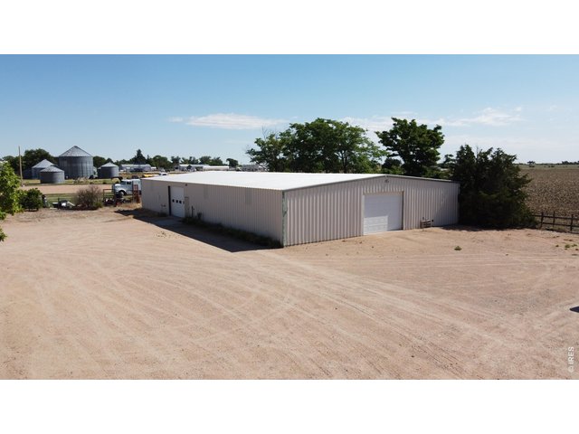 Property Photo 35 100'x60' shop with 2-14w x 10h overhead doors.