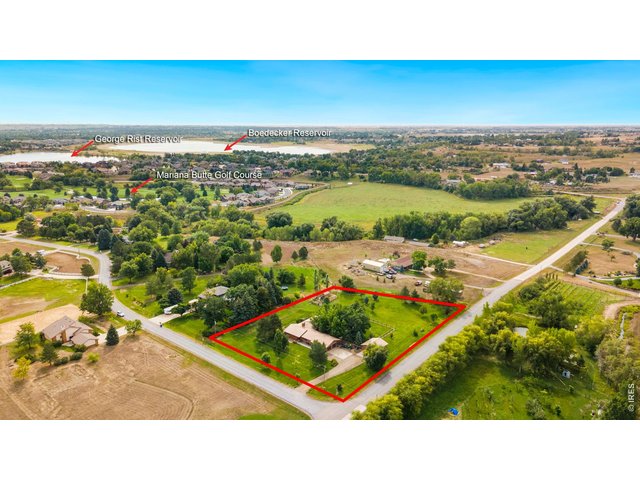 Property Photo 1 Tranquil acreage property in SW Loveland. Horses, livestock & 4H animals permitted, garden-ready with HOA-provided irrigation water. 