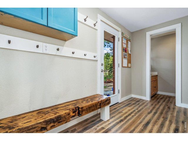 Property Photo 17 Backpack drop station, backyard door and tucked-away powder bath