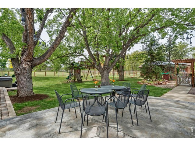 Property Photo 39 Lush, shady and party-ready back patio area
