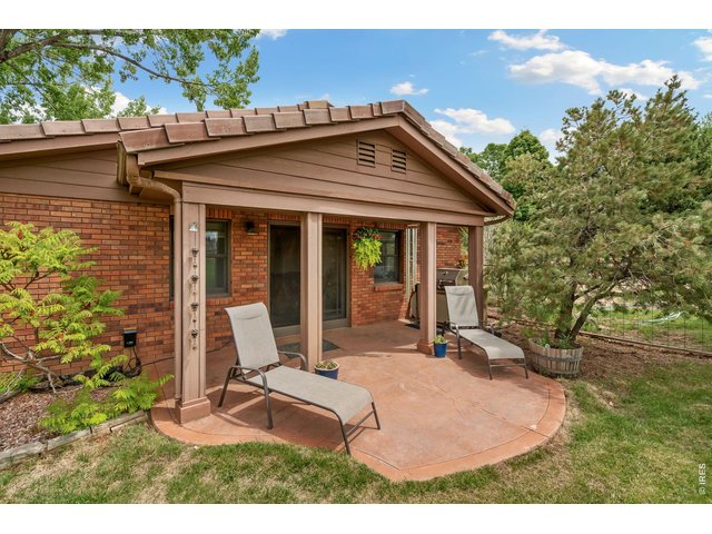 Property Photo 32 Access this a delightful patio area from the Family Room and enjoy, perfect lounging while you BBQ