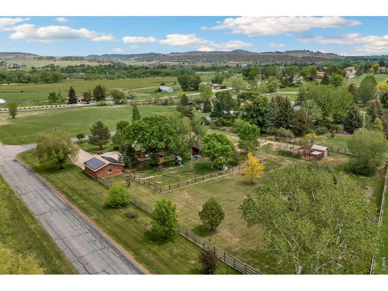 Stunning rural setting featuring breathtaking views of the Devil's Backbone Range. The back acreage is enclosed by five-foot, high-quality old-growth cedar fencing.