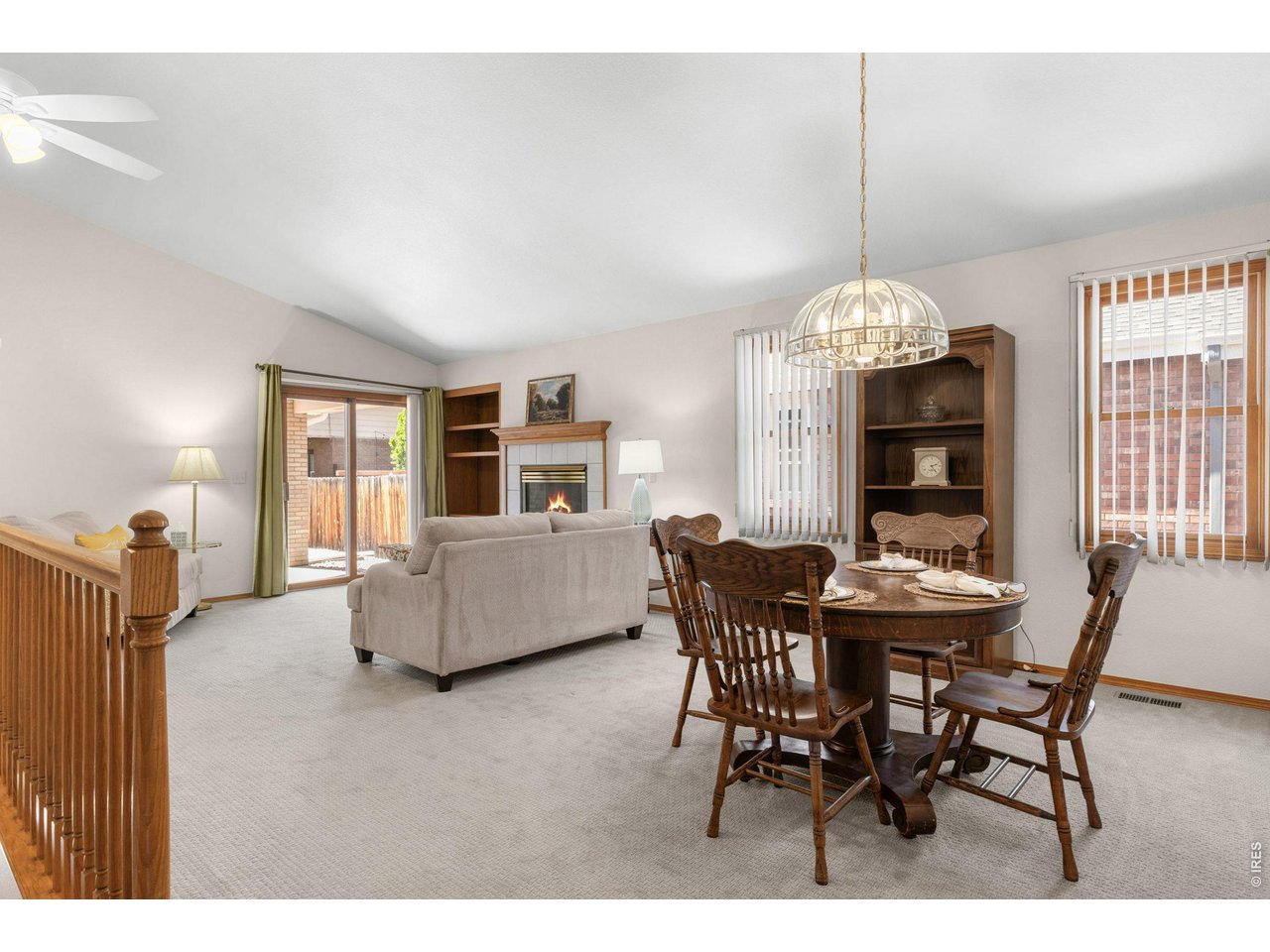 Family and dining room with access to the back patio.