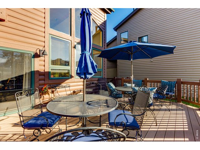 Property Photo 15 Oversized Deck with steps to lake