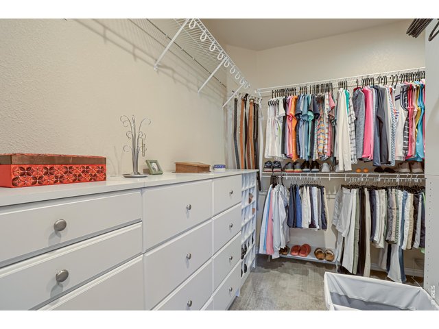 Property Photo 15 Primary closet with built in organziers