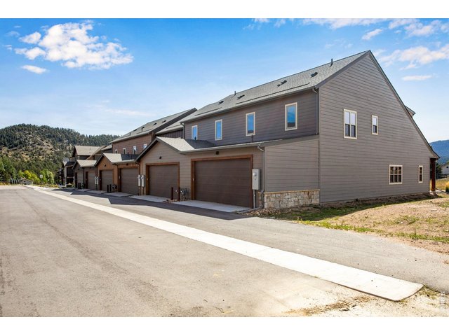 Property Photo 3 Each townhome features an attached, heated, and finished two car garage