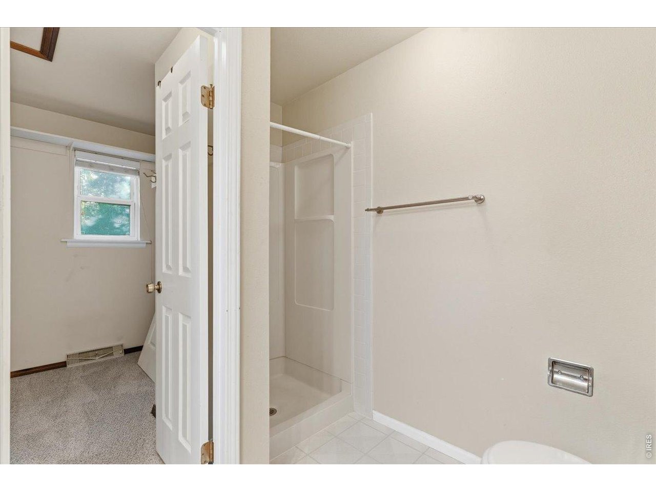 Property Photo 21 Ensuite shower and stool