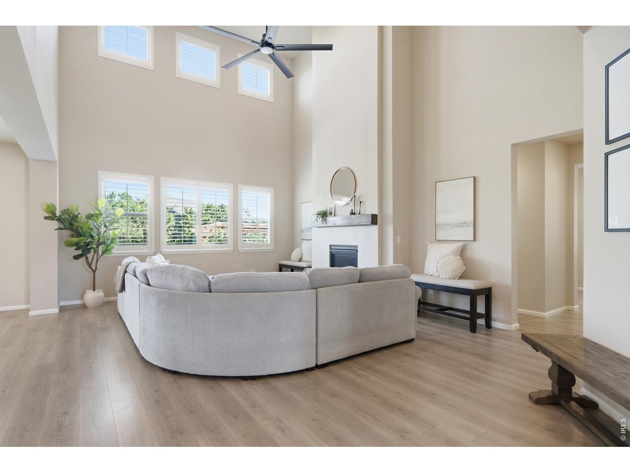 Property Photo 5 Large living room filled with an abundance of light