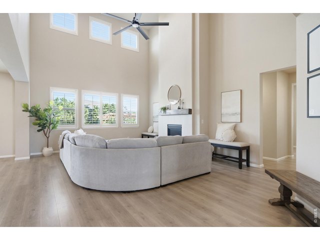 Property Photo 5 Large living room filled with an abundance of light