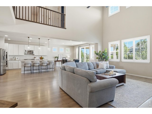 Property Photo 6 Living room opens up beautifully to the kitchen and dining