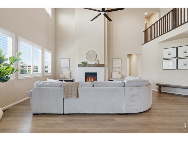 Property Photo 8 Floor to ceiling fireplace adds that elegant centerpiece