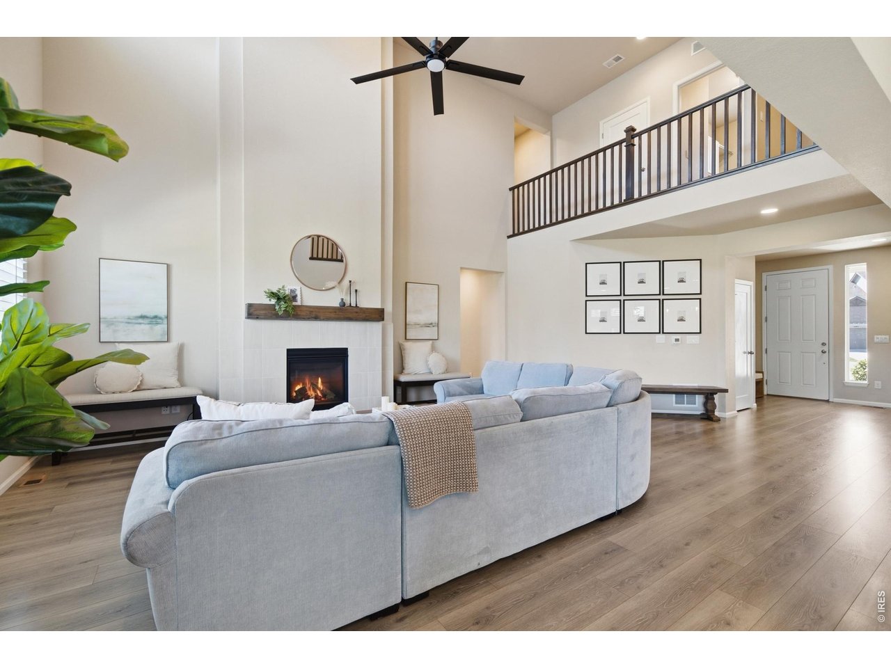 Property Photo 7 2-story ceilings make the living room feel even larger than it actually is