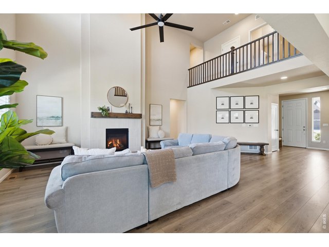 Property Photo 7 2-story ceilings make the living room feel even larger than it actually is
