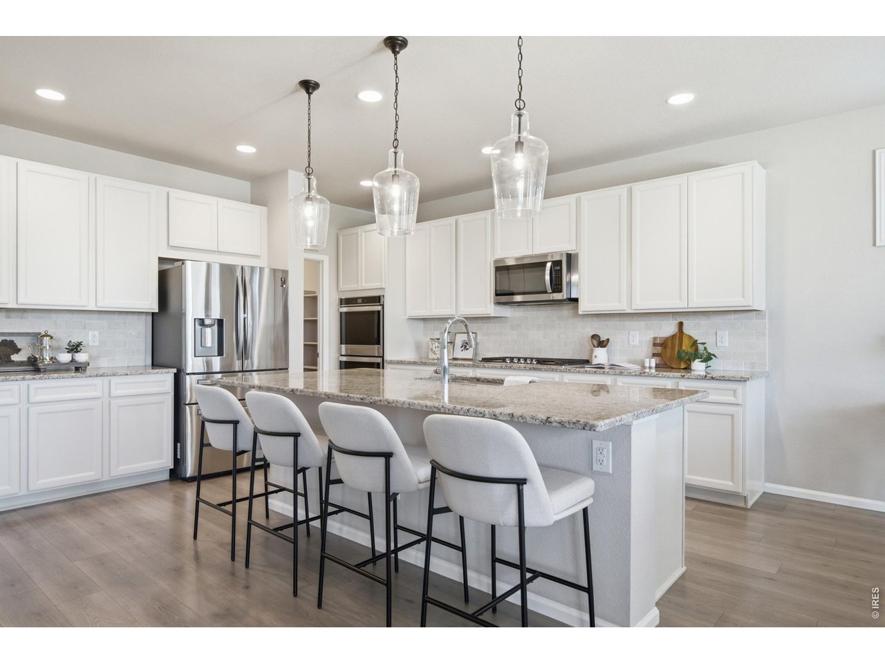 Property Photo 10 Gourmet kitchen with double oven and high-end finishes