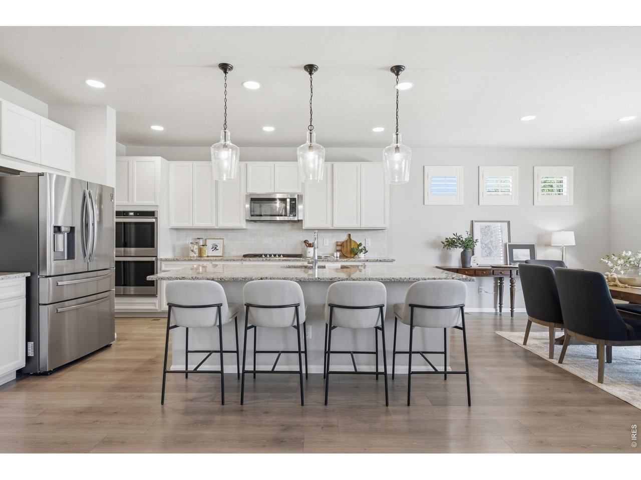 Property Photo 13 The southern exposure leads to a bright and welcoming entertaining space