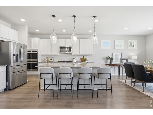 Property Photo 13 The southern exposure leads to a bright and welcoming entertaining space
