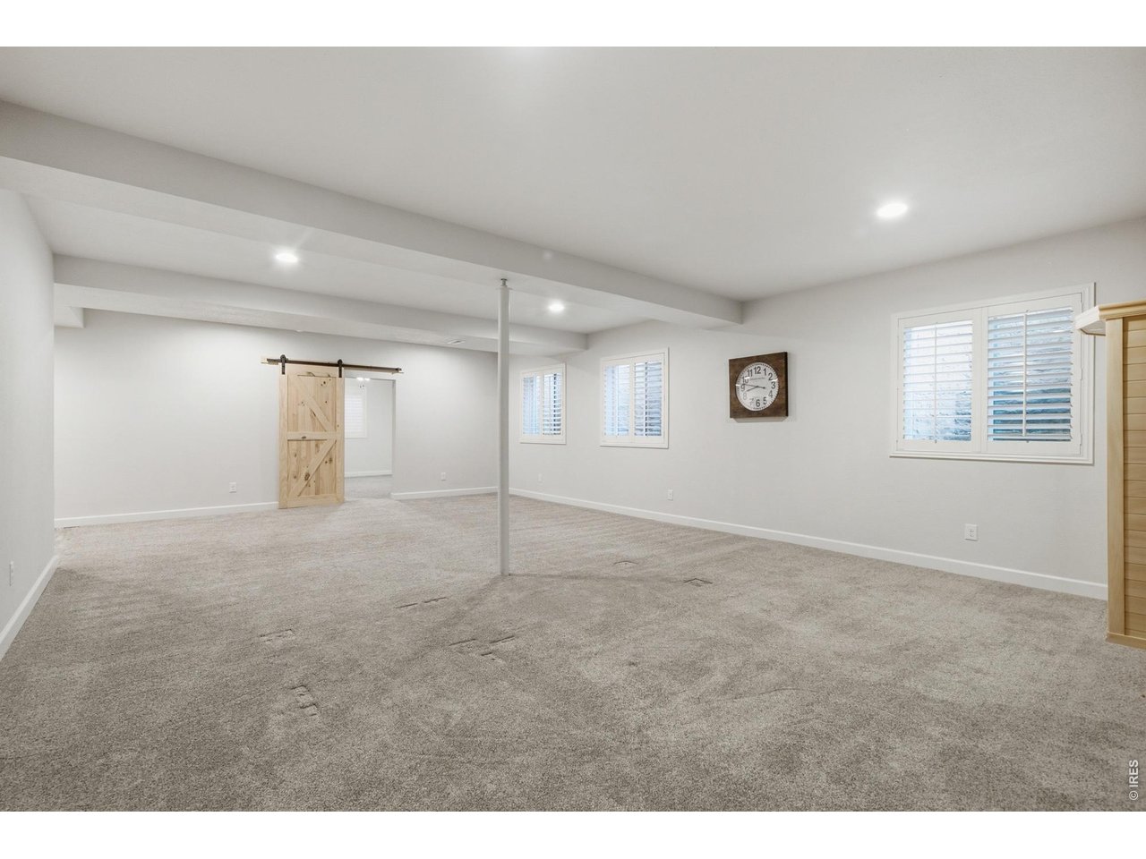 Property Photo 29 The rec room in the basement leaves the options to the imagination