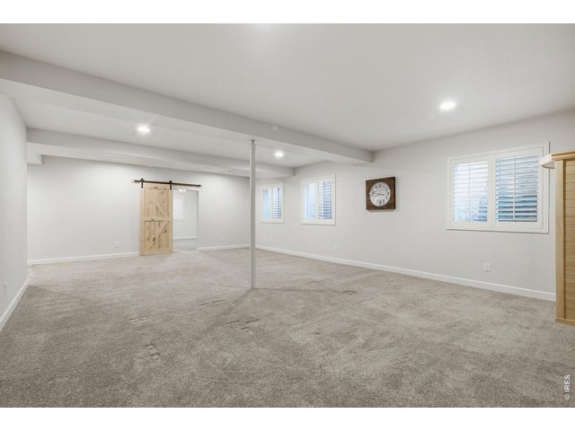 Property Photo 29 The rec room in the basement leaves the options to the imagination