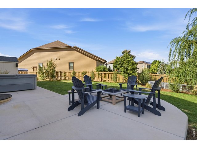Property Photo 32 One of three patio areas in the back is perfect for a firepit setup