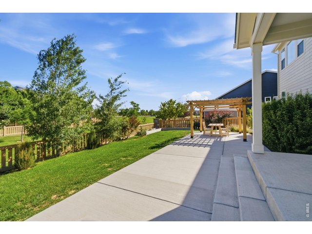 Property Photo 34 The 3 patio areas flow seamlessly together