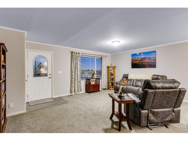Property Photo 11 Spacious entry with laminate landing and coat closet