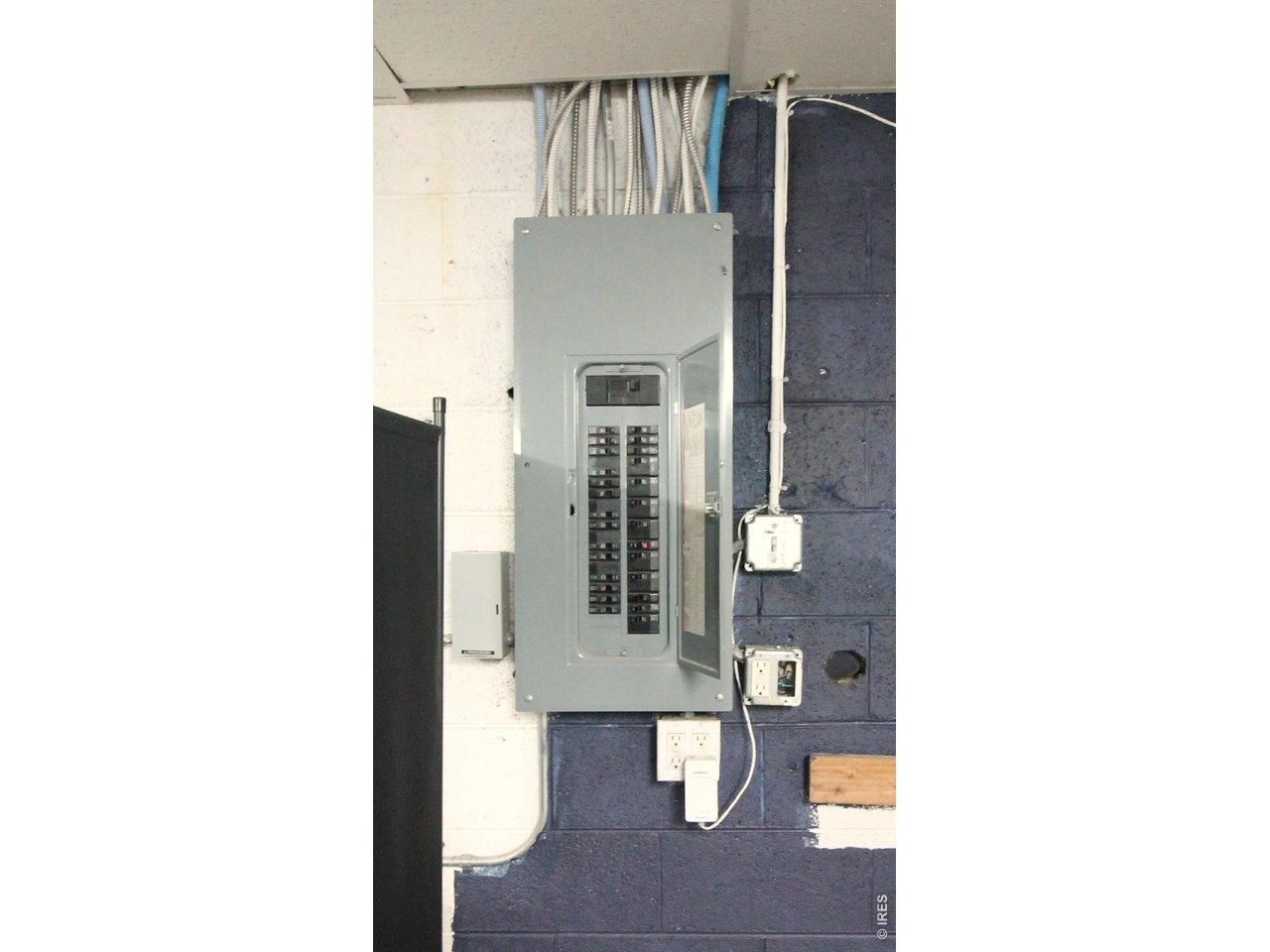 Property Photo 23 Upgraded electrical main level storage room