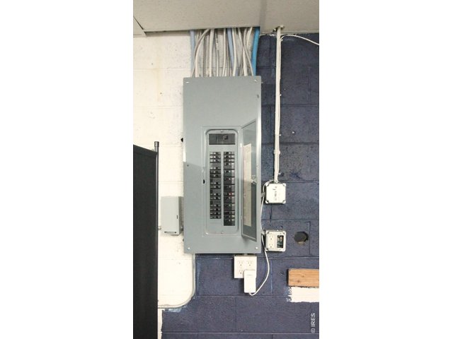 Property Photo 23 Upgraded electrical main level storage room